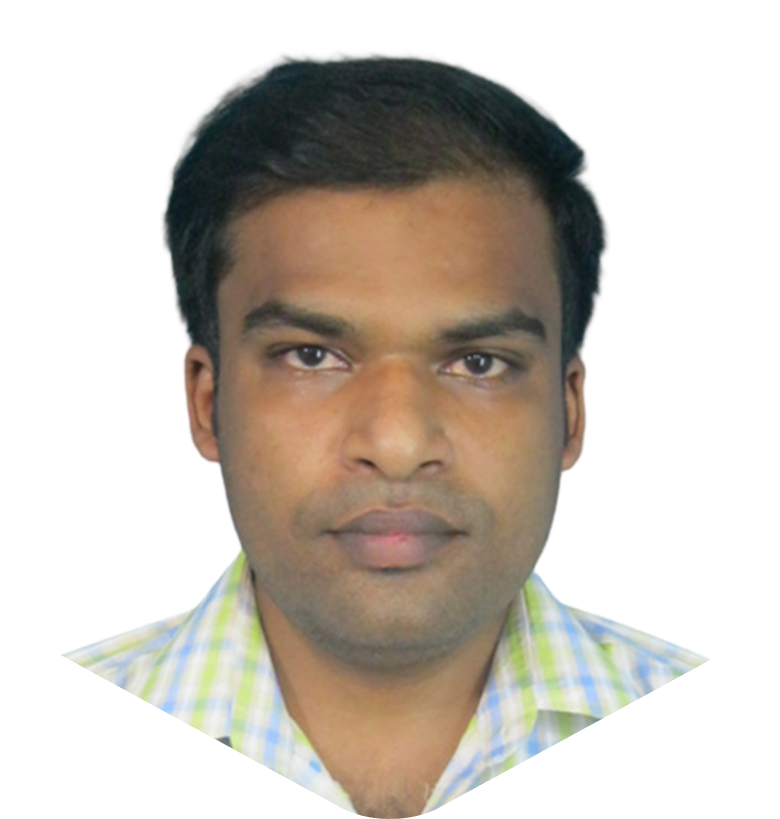 Head-and-shoulders portrait of a man with short black hair wearing a green plaid shirt against a white background, neutral expression.